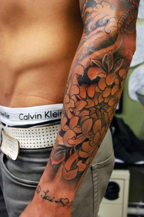Chrysanthemum tattoo on full sleeve for men