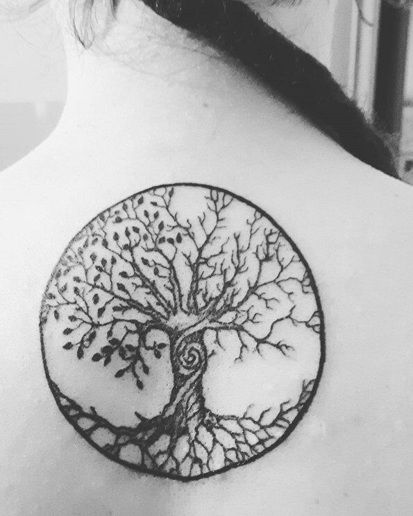 bodhi tree circle tattoo on back for females