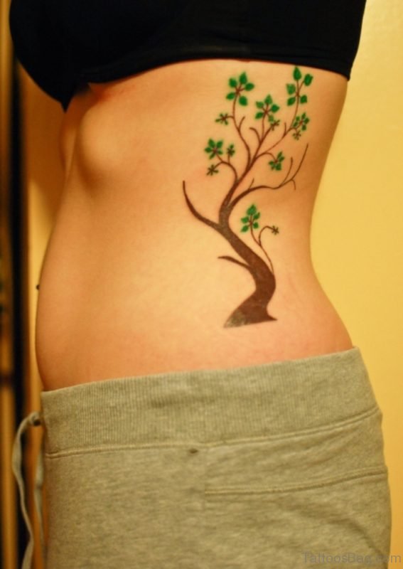 bodhi tree tattoo design on ribcage for women