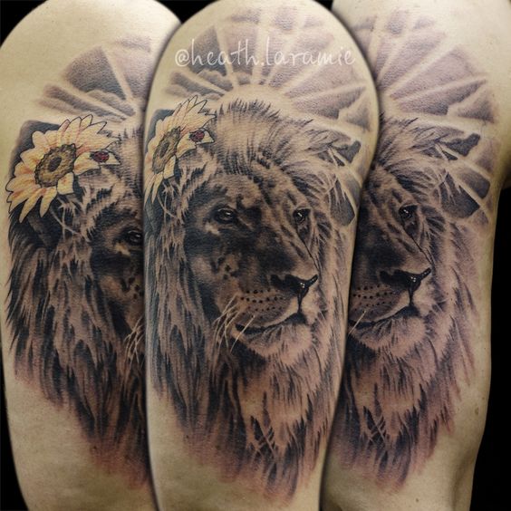 lion with sunflower upper sleeve men tattoo