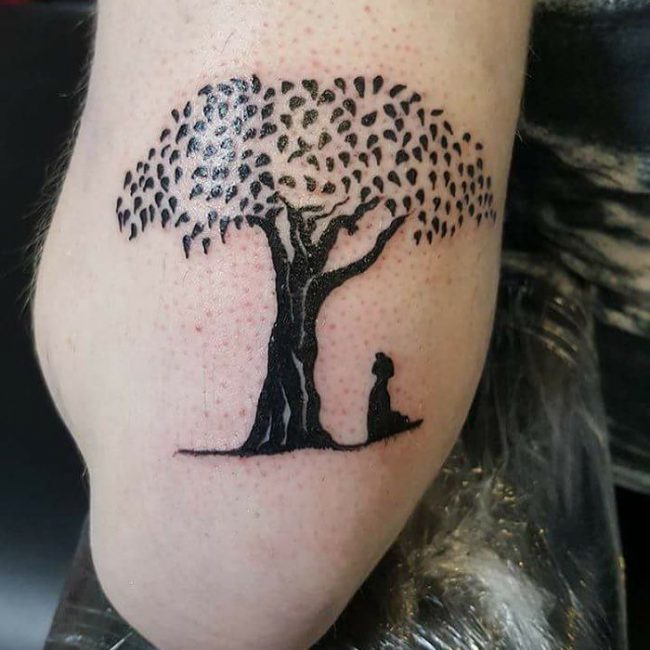 serene bodha mediating under a bodhi tree tattoo