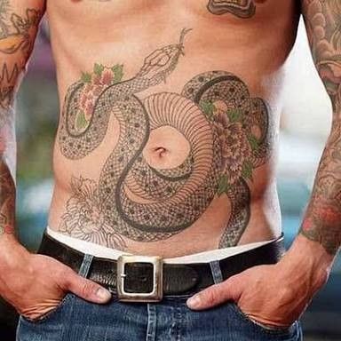 traditional japanese snake and carnation flower tattoo for men