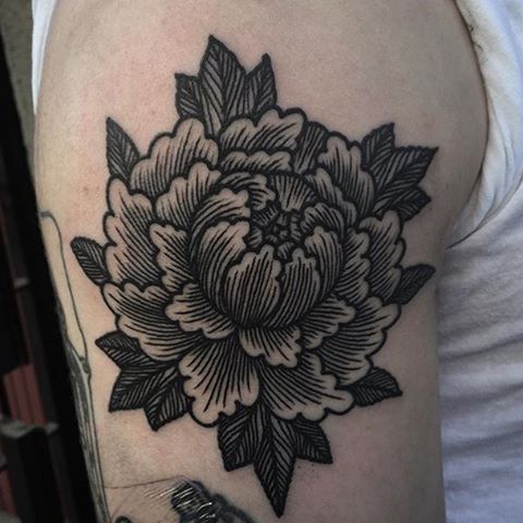 traditional peony flower tattoo on shoulder for men