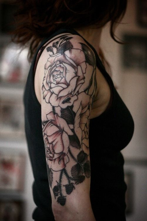 black and white rose flowers tattoo on female half sleeve