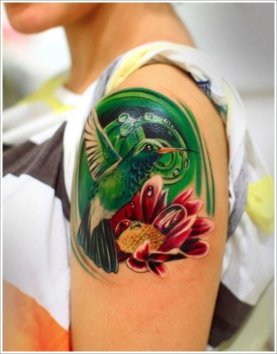 female quarter sleeve hummingbird and flower tattoo