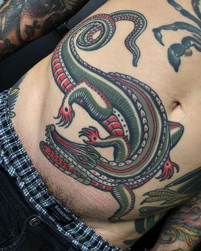 old school crocodile tattoo design on belly