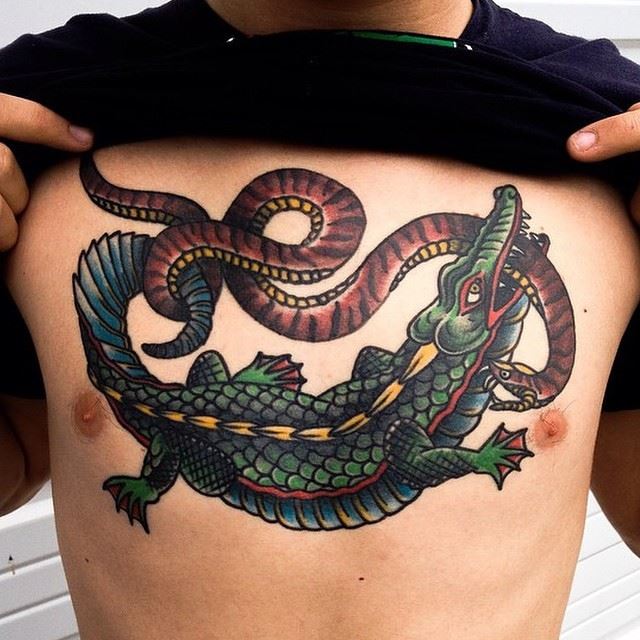 snake fighting crocodile tattoo design on chest
