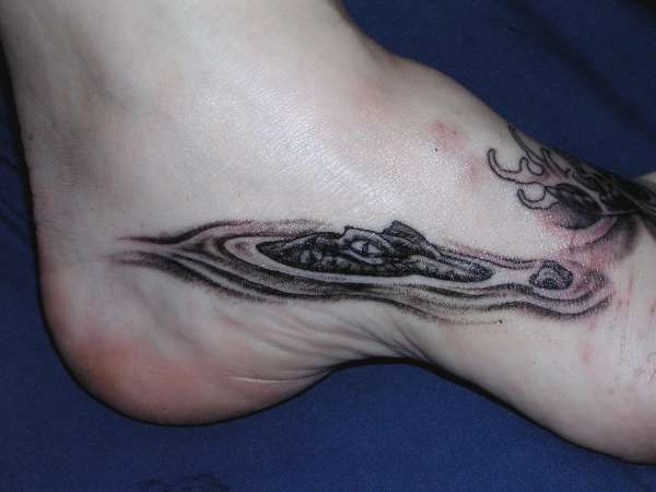 sneaking underwater crocodile tattoo design on feet