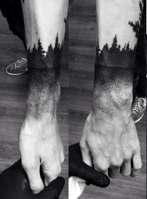 thick evergreen trees forrest tattoo on men arm