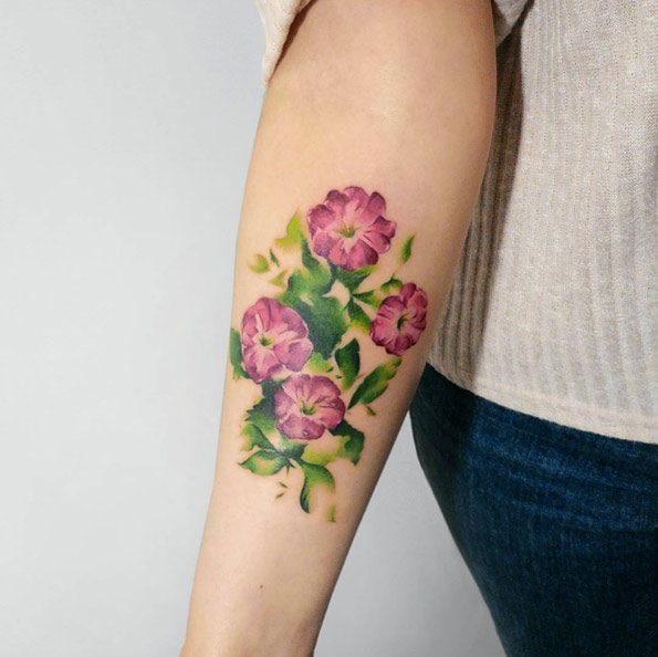 watercolor flower tattoo design on forearm for women