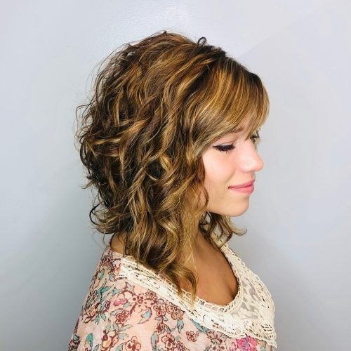 thick curly layered haircut for medium hair