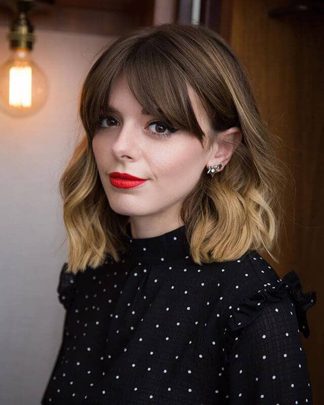 shoulder length side swept layered bangs haircut