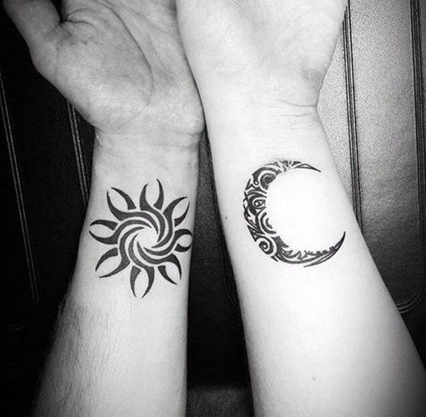 matching tribal sun and moon tattoo designs on wrist for couples