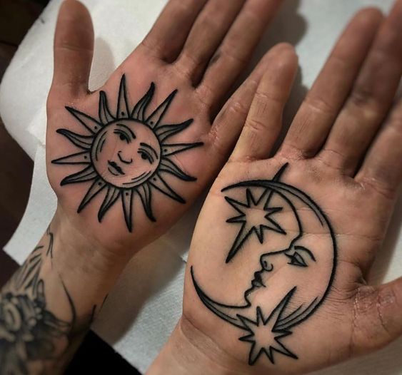 outlined sun and moon tattoo designs on palm