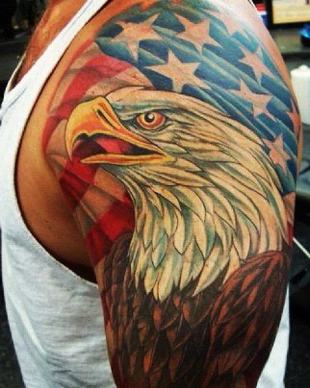 bald eagle with american flag tattoo design on men sleeve