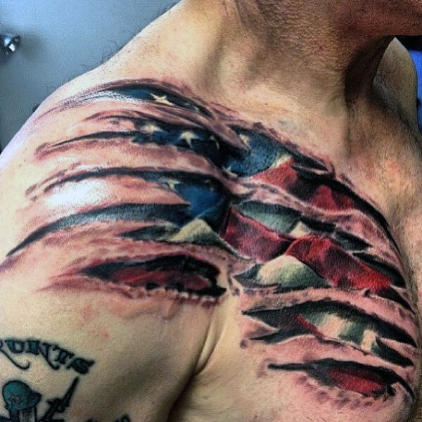 ripped skin american flag with eagle tattoo on chest