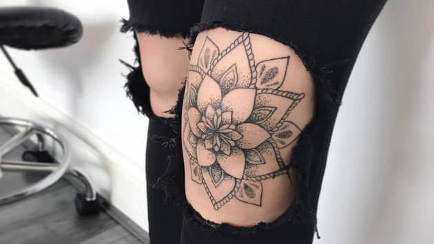 dotwork mandala tattoo design on knee