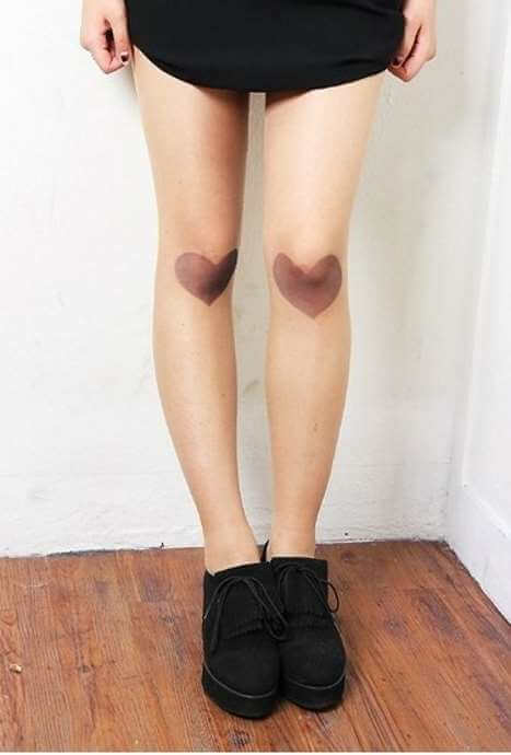 thumb print heart tattoos on knee cap