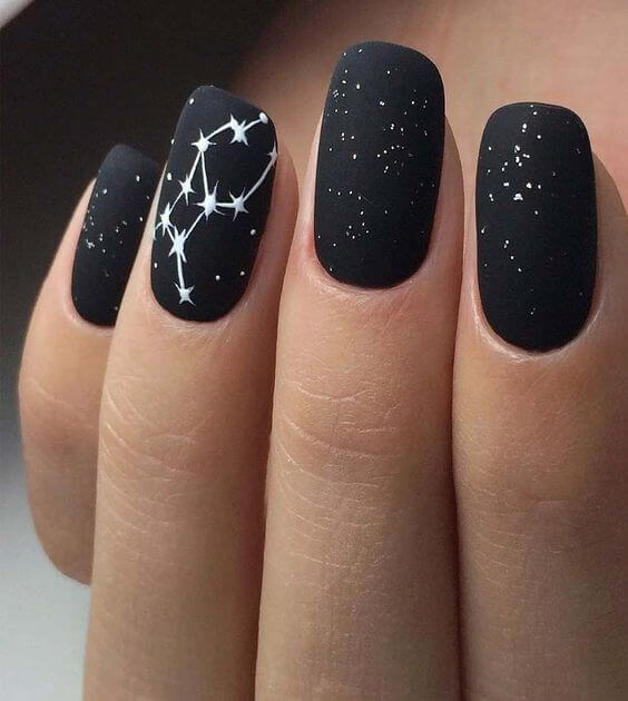 black cosmic acrylic nail designs