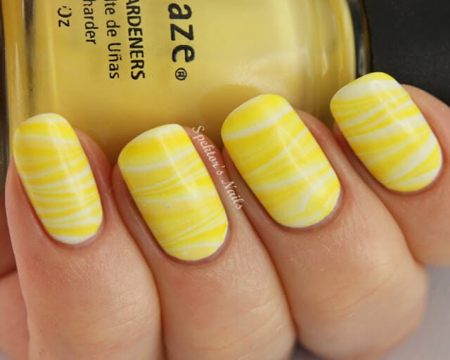 yellow zigzag nail designs