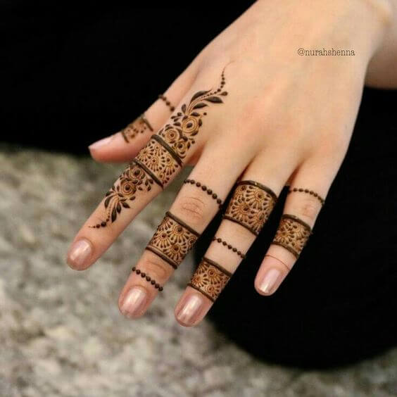 new floral henna ring designs on fingers