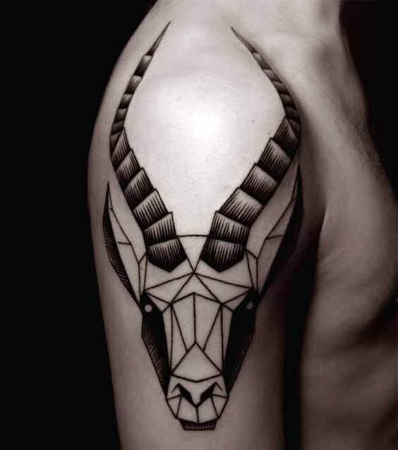 geometric capricorn goat head tattoo design on shoulder for men