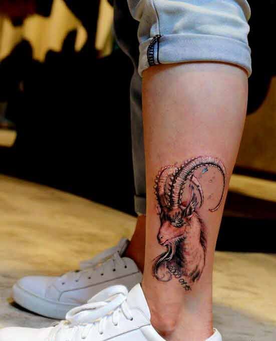 goat tattoo design on leg
