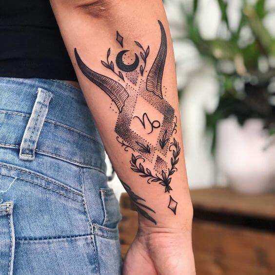 traditional dotwork capricorn goat symbol tattoo design on side arm