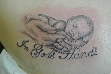 baby in gods hands tattoo design