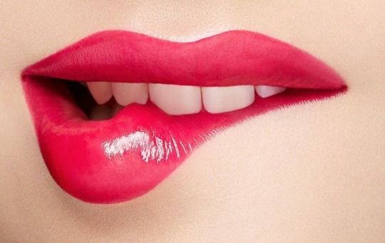 girls biting lips a cute sexy thing that guys love the most