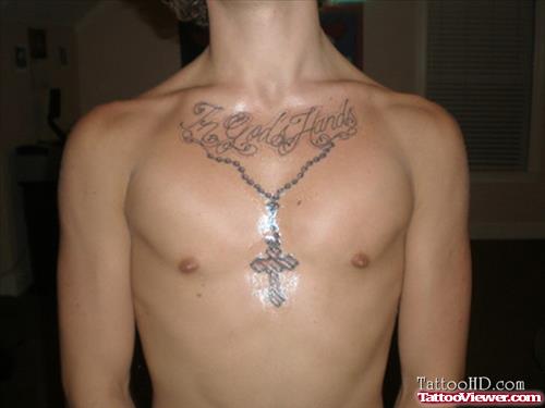 in gods hands tattoo with rosary beads cross design on chest