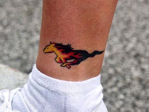 flame mustang pony tattoo on ankle