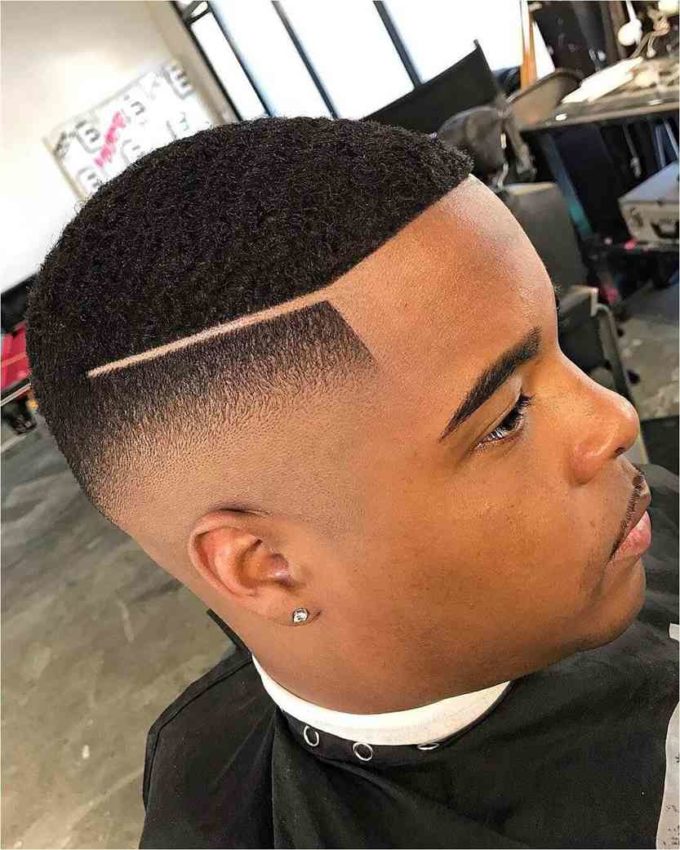 low skin fade buzz cut with part