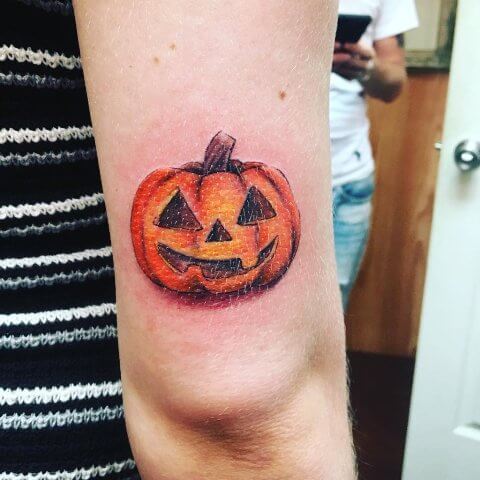 small jack o lantern tattoo idea for halloween
