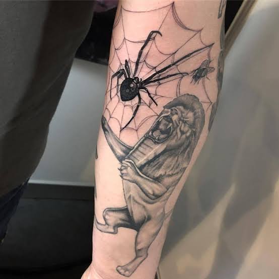 back arm spider web tattoo