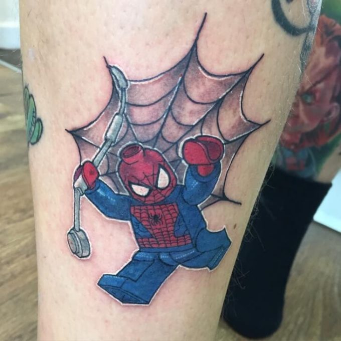 black and grey spider web tattoo