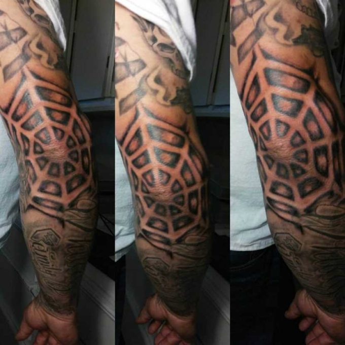 elbow spiderweb tattoo idea for men