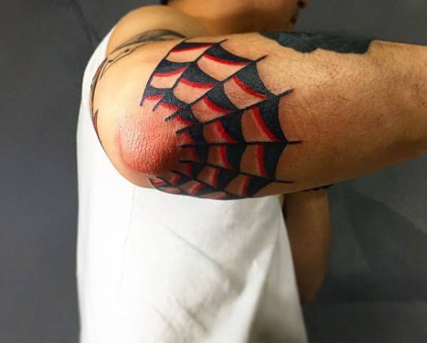 old school spider web elbow tattoo