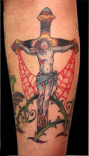 red spider web tattoo
