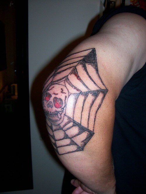 spider web elbow tattoo