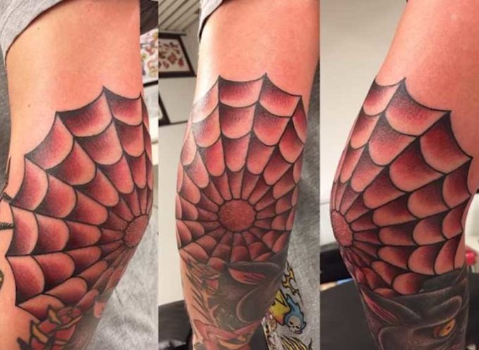 spider web tattoo design on elbow