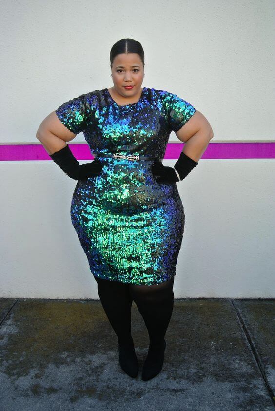 peacock blue sequenced dress with black boots outfit