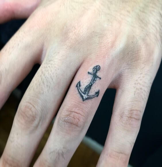 mens finger tattoo