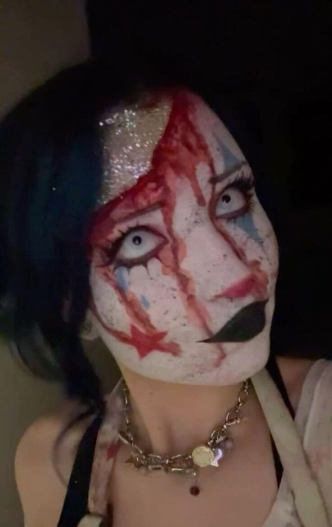 bloody Halloween makeup with bleeding beauty for a glamorous horror Halloween look