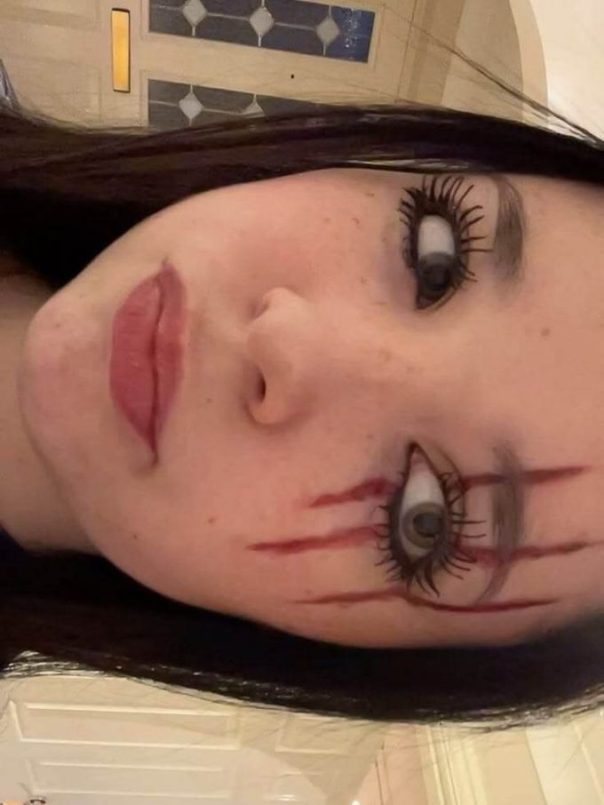 creepy doll eye cut with bloody halloween makeup